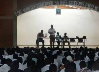 A group of people present in an auditorium